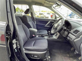Driver seat and dashboard of Subaru Forester – comfortable and functional SUV interior for rental in Hokkaido