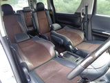 Driver seat and dashboard of Toyota Alphard 20 – comfortable and premium minivan rental in Hokkaido