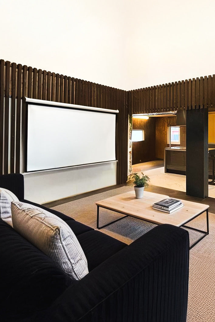 Spacious living room with modern furniture and high ceiling in a family friendly Hokkaido villa for group stays or weekly rental near Sapporo