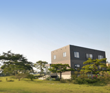 Spring Hokkaido Villa stay perfect for visiting Furano lavender fields with a private garden, BBQ area, and cherry blossoms blooming beside a local power spot shrine