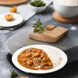 Bon Curry Gold Medium Spicy Serving Image A flavorful medium-spicy retort curry served over rice, made with domestically sourced Japanese vegetables for a quick and delicious meal.